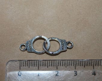 Silver handcuffs charm
