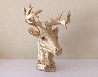 faux deer head, deer bust, table top, very detailed, gold
