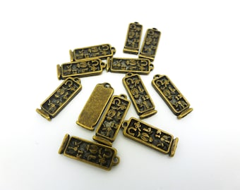 10 rectangle charms ethnic symbols of luck 14 * 5mm bronze (PHBB06)