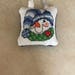 Snowman with blue striped hat