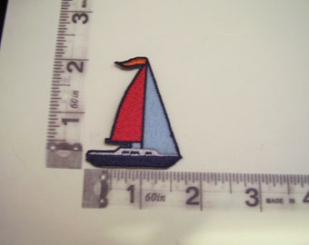 Red and blue sailboat iron on patch
