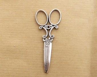 a vintage silver 60mm scissors pendant