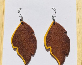 Brown leather leaf earrings with mustard yellow detail