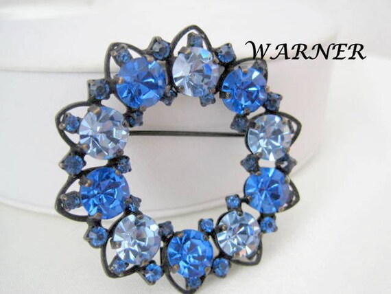 Blue Rhinestone Brooch, Warner Signed Circle Pin, Bright Rhinestones, Japanned Setting