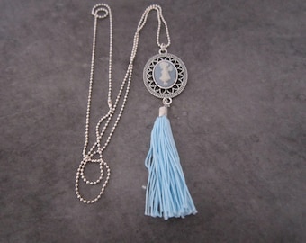 Blue cameo necklace.