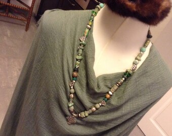 Creative Ethnic necklace, Afghan Turquoise,Ethiopian silver coptic cross, amulets, fertility symbols, beads, old glass, lava. Boho jewelry.