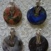 Four Sterling Silver Wire Wrapped Pendants.