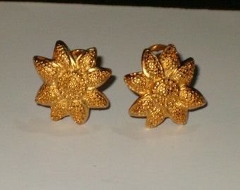 Vintage Signed Monet Gold Tone Textured Flower Clip On Earrings