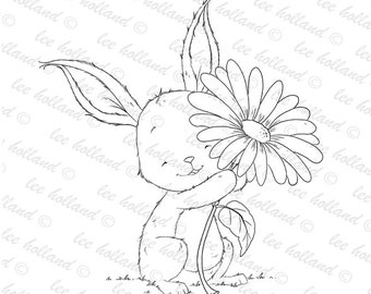 Bunny holding flower