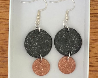 Lightweight glam dangle earrings! Black & copper with silver trim.