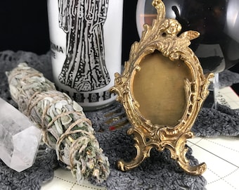 Small Brass Angel Picture Frame. Miniature Table Top Gilt Angel Picture Holder. Ornate Tiny Angel Adorned Oval Frame. Angelic Memento Mori