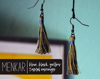 Menkar | black, blue, and yellow tassel earrings