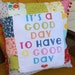 Its a good day for a good day- a colorful, quirky, unique pillow.