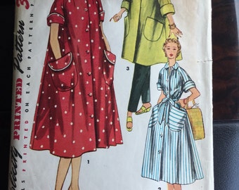 Simplicity 4471; ©1953; Misses' and Women's Robe in Two Lengths: "Simple to Make" robe is styled with cuffed raglan sleeves.