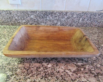 Small hand carved rectangular wood bowl- nice condition and beautiful