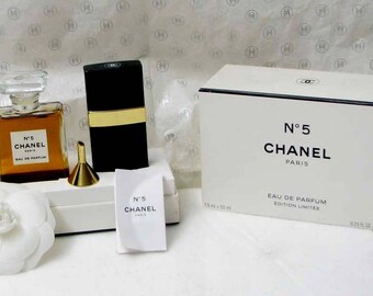 CHANEL perfume, a limited edition of the number 5 with a spray of bag