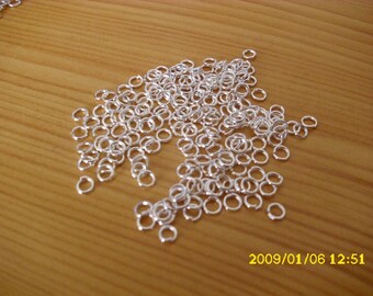 set of 10 grams 3x0.7 mm silver rings