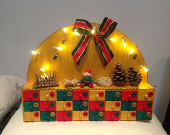 Wooden Christmas advent calendar. Pixie