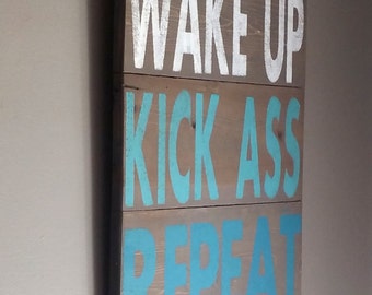 Inspirational saying reclaimed wood sign.. Wake up, kick ass, repeat