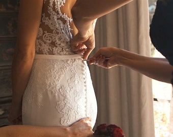 300 crochet hooks to button wedding dress