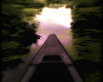Black River Canoe: Canvas Wall Art