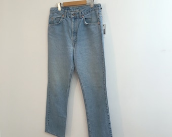Vintage FADED LEVIS JEANS / size 30-32