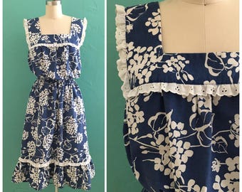 70's blue floral print dress with eyelet trim