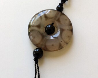 Tibetan Dzi Pendant: 100% of profits support children in Vietnam