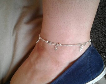 Silver anklets with charms