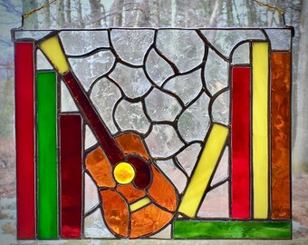 bookshelf with guitar