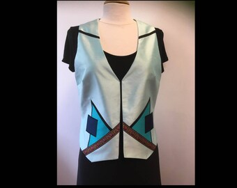 Woman silk - sleeveless bolero jacket