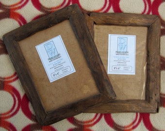Rustic/driftwood style frames in locally sourced,recycled mahogany in medium dark or very dark wax finish.To fit 8"x6". Free U.K. shipping
