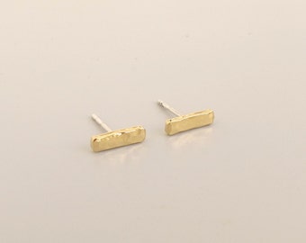 Hammered yellow gold tiny rod post earrings