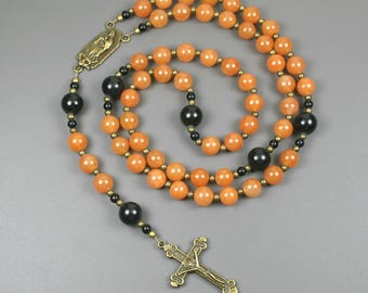 Red aventurine, obsidian, and antiqued brass rosary in the Roman Catholic style with Our Lady of Guadalupe connector