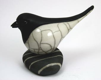 Bird on Pebble looking forward - ceramic raku fired sculpture