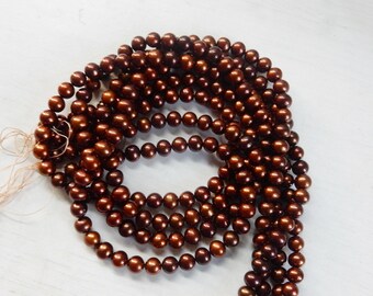 6-7mm Brown freshwater potato pearls, roundish , FULL STRAND