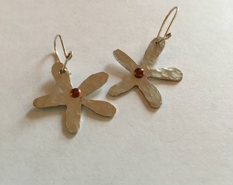 Silver hammered flowers with a copper rivet centre