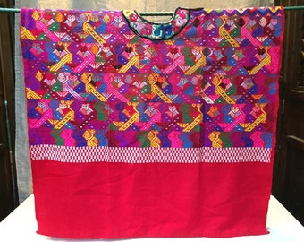 Vintage Guatemalan huipil with bright colors