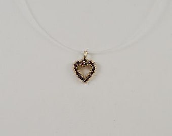 14k Yellow Gold Heart Pendant With Deep Red Stone