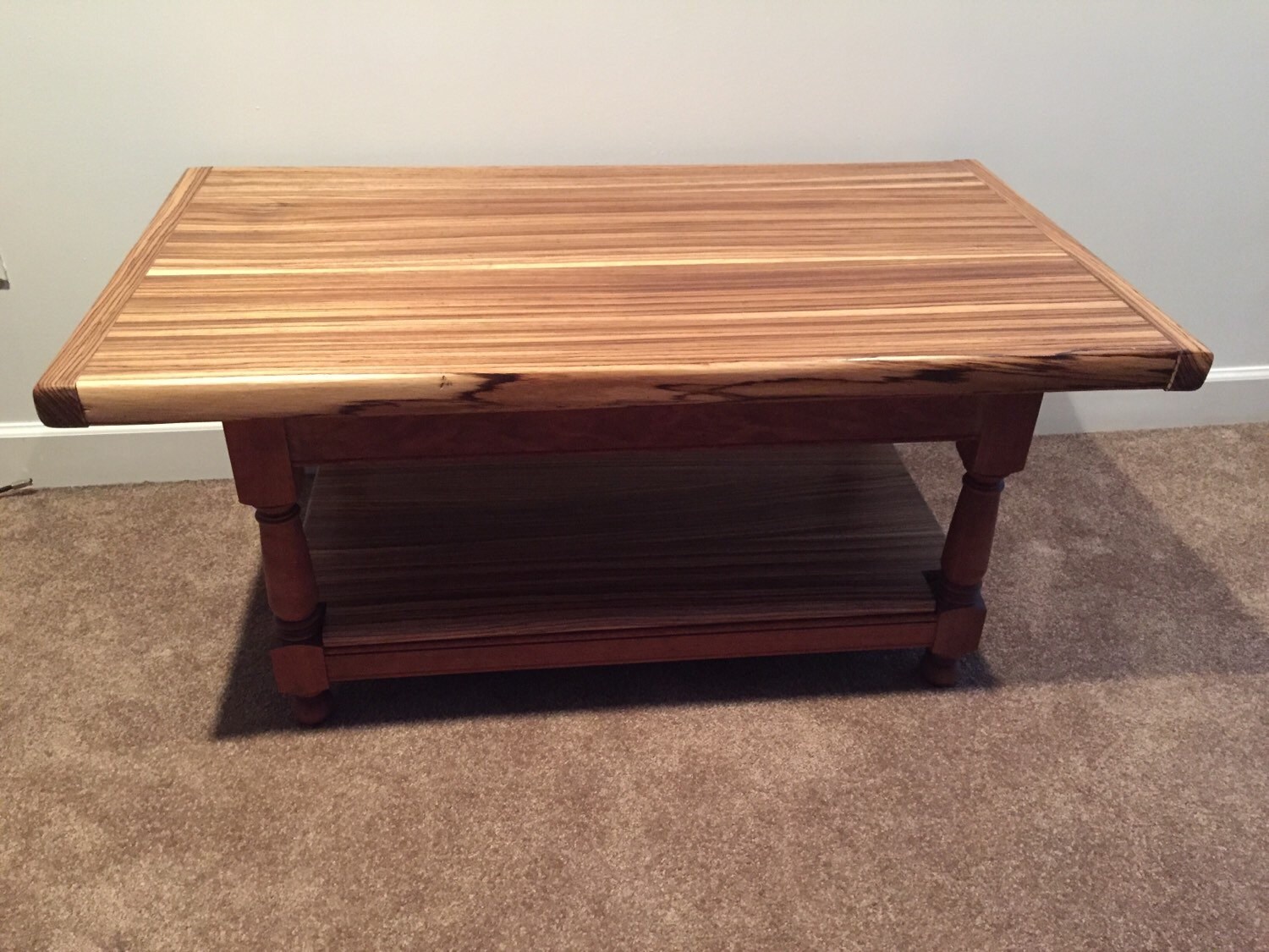 Zebra wood coffee table with mortise and tenion base.