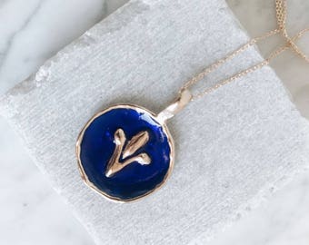 fleur de lis necklace (navy blue)- FREE SHIPPING