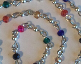 55cm of string/rondelles 4mm multicolored glass beads