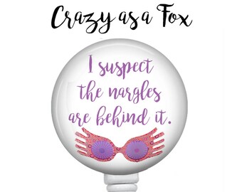 I suspect the Nargles Retractable Badge Holder, Badge Reel, Lanyard, Stethoscope ID Tag, Nurse, RN, Doctor, Student, Harry Potter inspired