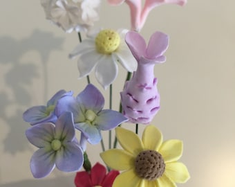 Clay flowers - 7 small mixed handmade deco clay flowers in a paper vase