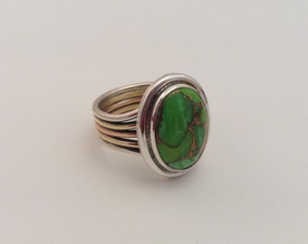 sterling silver tri-metal ring with green turquoise cabochon