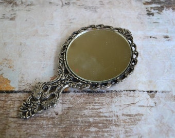 Vintage hand mirror.Nickel silver embossed hand mirror.round mirror.Greek memorabilia.Bas Relief Hand mirror.Gifr for her.Item from 60's.