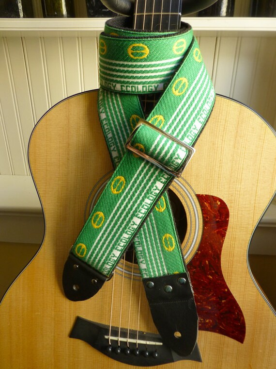 ONE SALE Handmade Ecology guitar strap from Vintage NOS trim