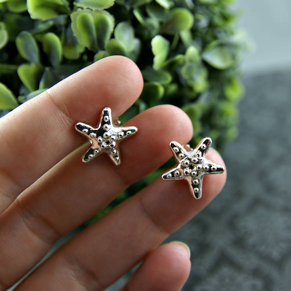 Boucles oreilles clips étoile de mer rhodiée filles (non percées
