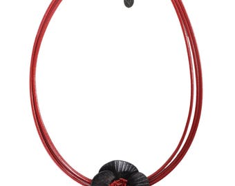 Necklace black poppy on red leather lace