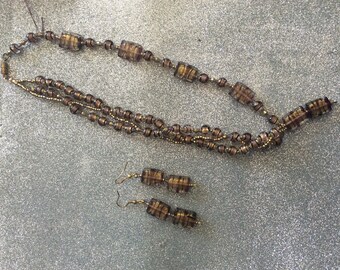 18 1/2" purple and gold color necklace with earrings.